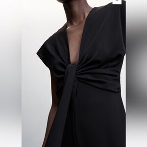 Brand new with tag black jumpsuit, great for work or dressed up night out!